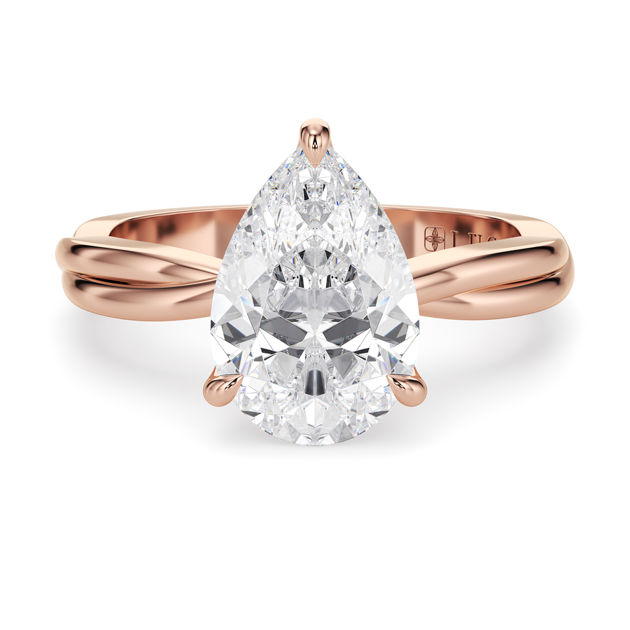 Load image into Gallery viewer, LUCCE Twisting Pear Solitaire Diamond Engagement Ring with Petal Prongs in Gold or Platinum
