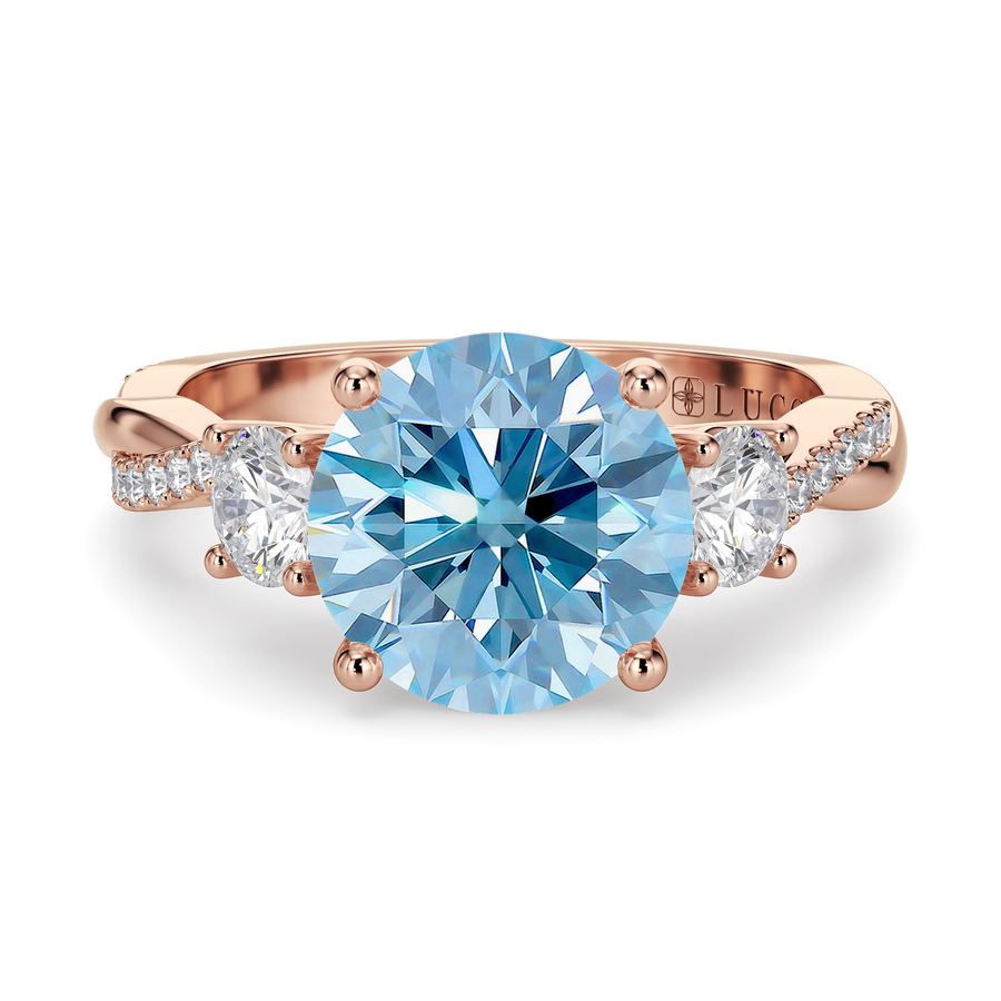 Load image into Gallery viewer, LUCCE Twisting Pavé Round Trilogy Blue Diamond Engagement Ring with Petal Prongs in Gold or Platinum
