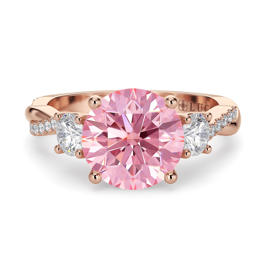 Load image into Gallery viewer, LUCCE Twisting Pavé Round Trilogy Pink Diamond Engagement Ring with Petal Prongs in Gold or Platinum
