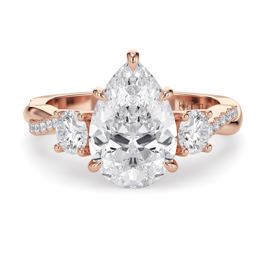 Load image into Gallery viewer, LUCCE Twisting Pear Pavé Trio Diamond Engagement Ring with Petal Prongs in Gold or Platinum
