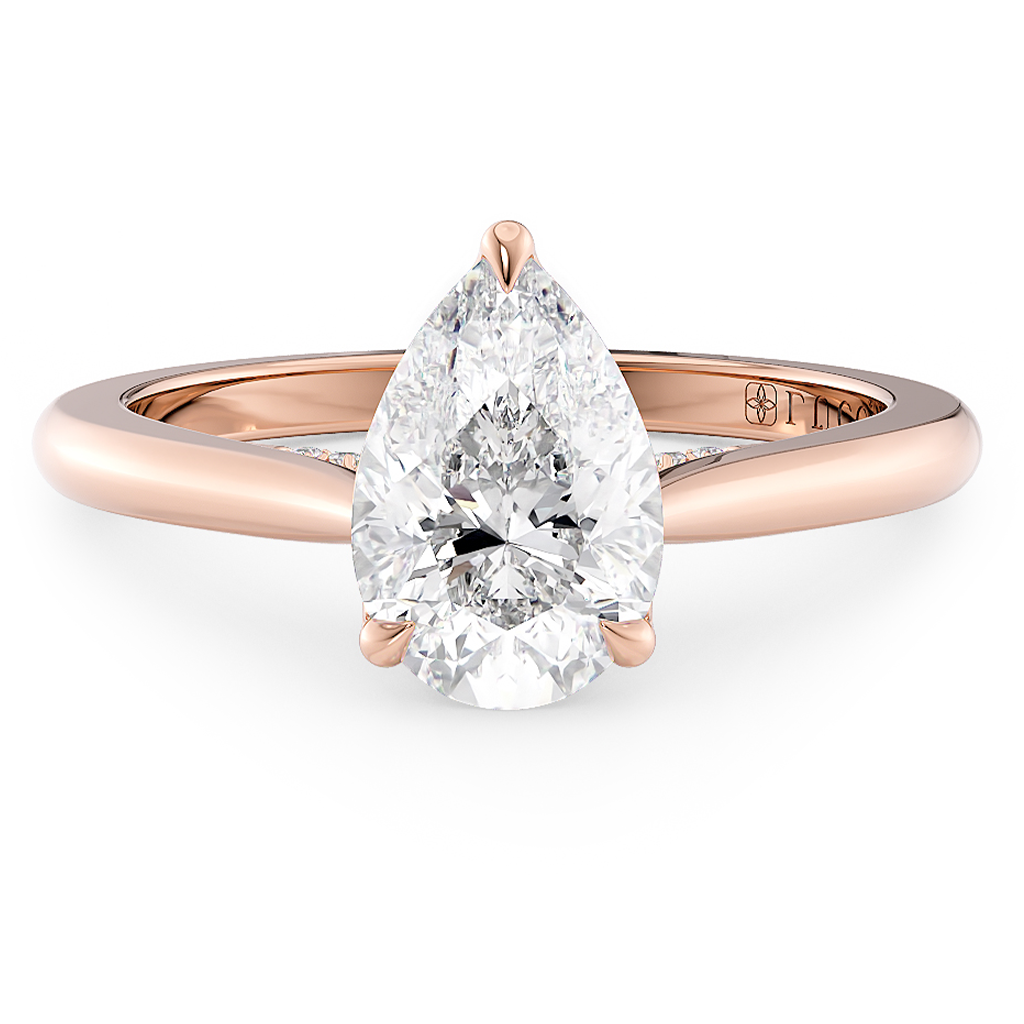 Load image into Gallery viewer, LUCCE Cathedral Pear Diamond Solitaire Engagement Ring with Petal Prongs and Hidden Accent Stones in Gold or Platinum
