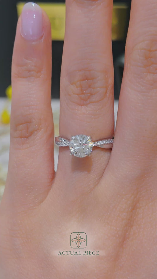 LUCCE Twisting Pavé Round Diamond Engagement Ring with Petal Prongs in Gold or Platinum