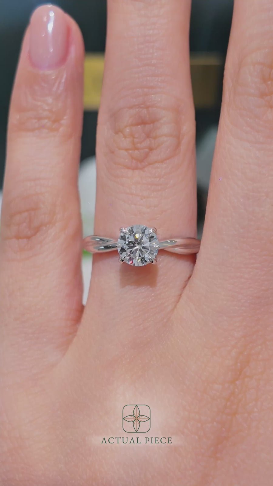 Load and play video in Gallery viewer, LUCCE Twisting Round Solitaire Diamond Engagement Ring with Petal Prongs in Gold or Platinum
