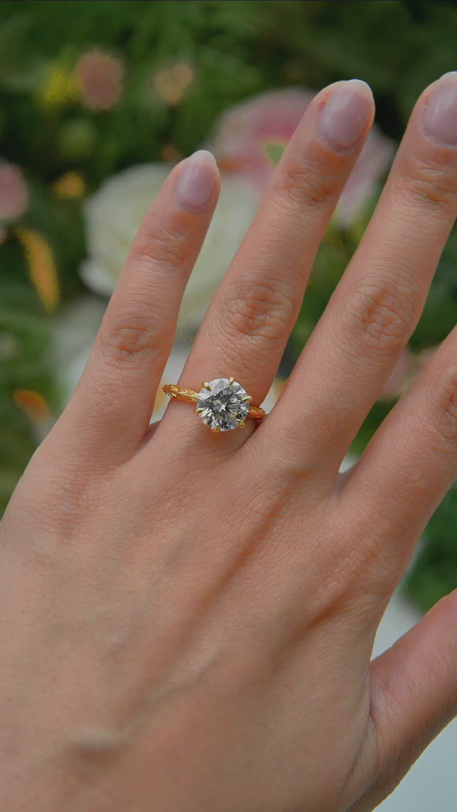 Load and play video in Gallery viewer, LUCCE Leaf Motif Carved Knife Edge Cathedral Round Diamond Solitaire Engagement Ring with Overlapping Petal Prongs in Gold or Platinum
