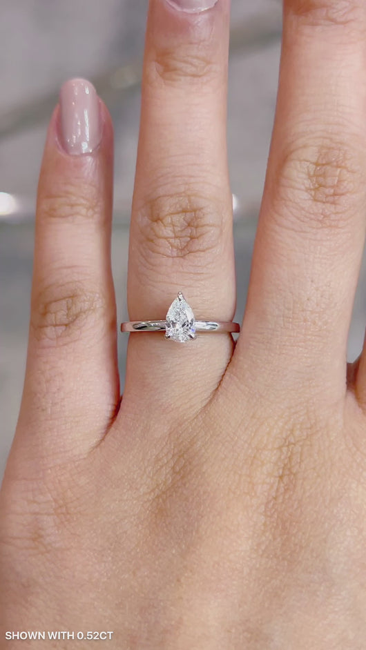 Pear Solitaire Diamond Engagement ring with Gold or Platinum band and petals Manila Philippines