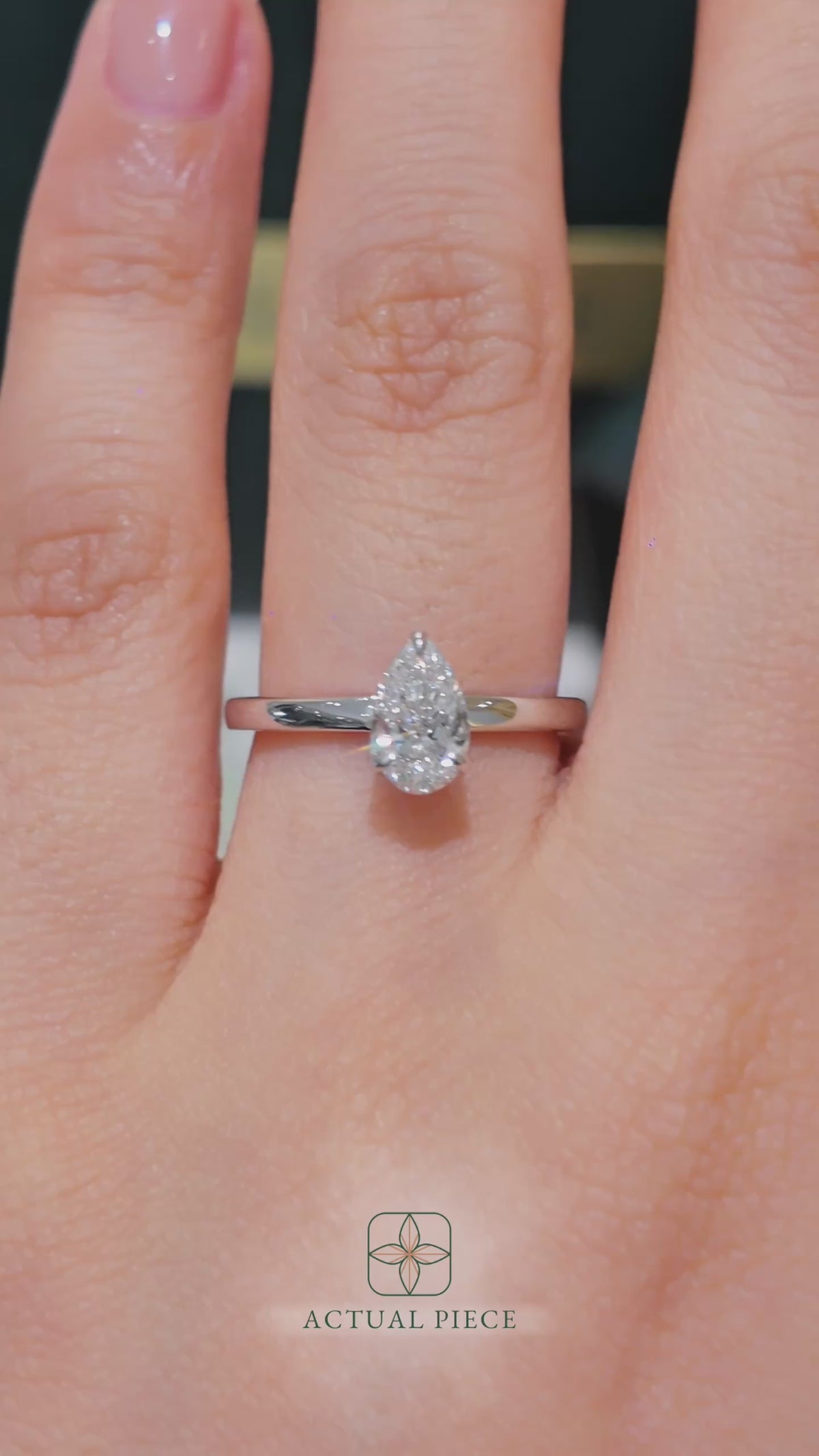 Load and play video in Gallery viewer, LUCCE Solitaire Pear Diamond Engagement Ring with Hidden Halo and Petal Prongs in Gold or Platinum
