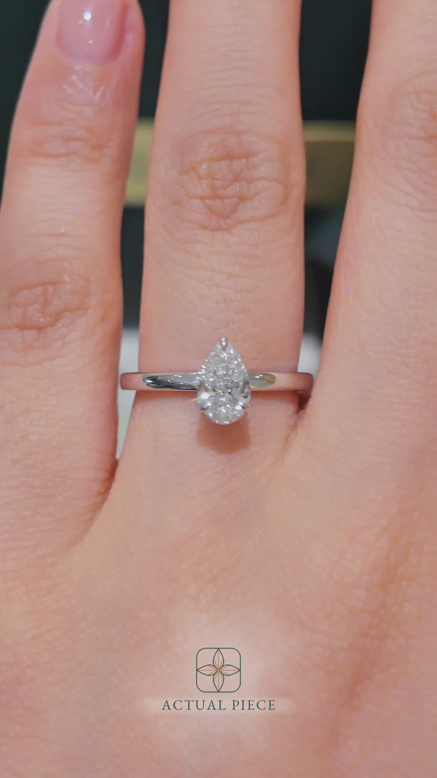Load and play video in Gallery viewer, LUCCE Solitaire Pear Diamond Engagement Ring with Hidden Halo and Petal Prongs in Gold or Platinum
