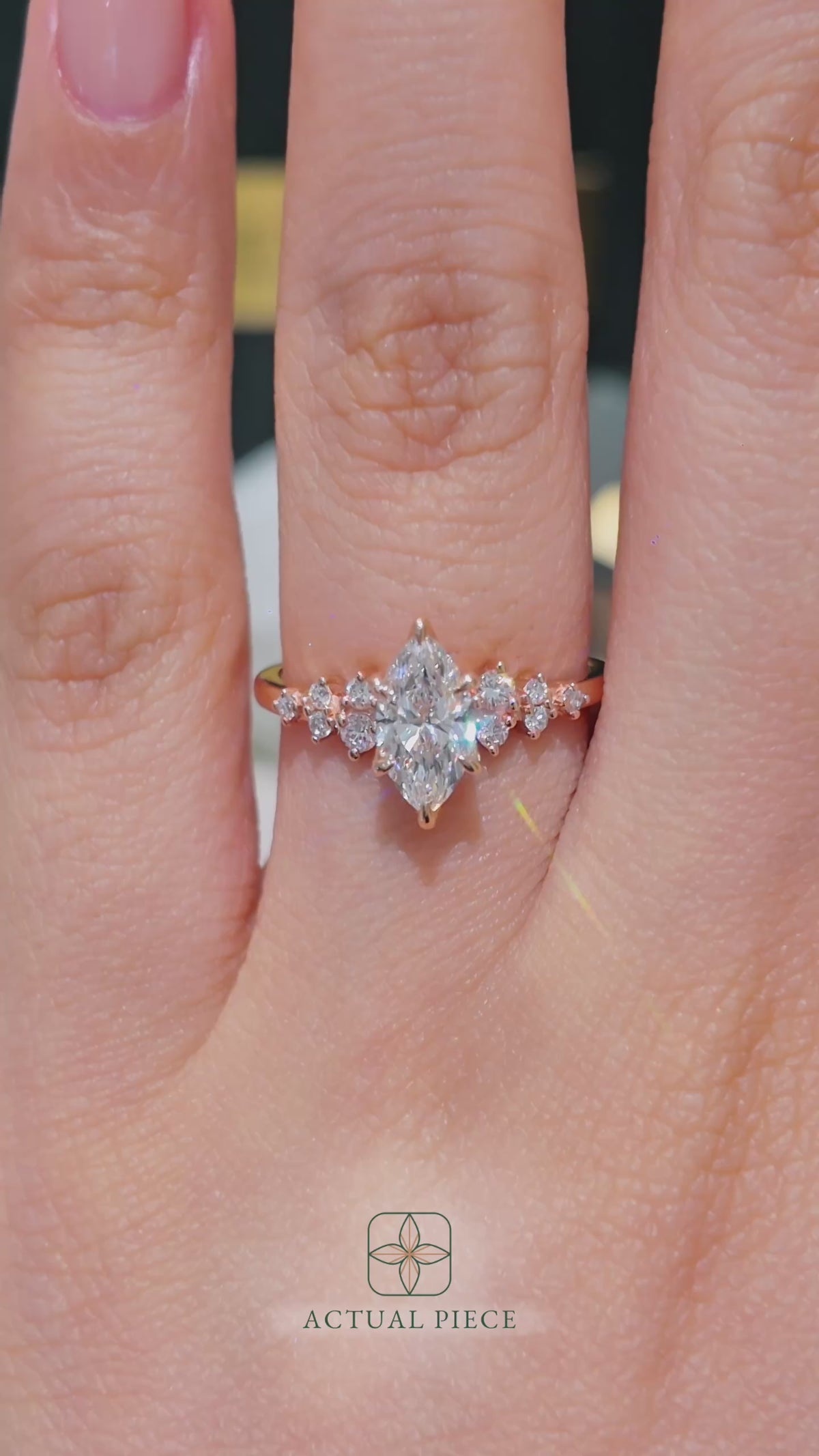 Load and play video in Gallery viewer, Lucce Ellia Marquise Diamond Engagement Ring with Round cut Clusters and Petal Prongs in Rose Gold
Manila, Philippines
